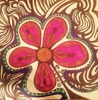 a drawing of a flower on a piece of paper