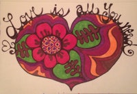 a drawing of a heart with the words love is all you need